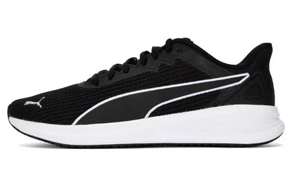 Chaussures de course basses en cuir synthétique moderne Puma Transport, modèle 377030-01, noir et blanc.