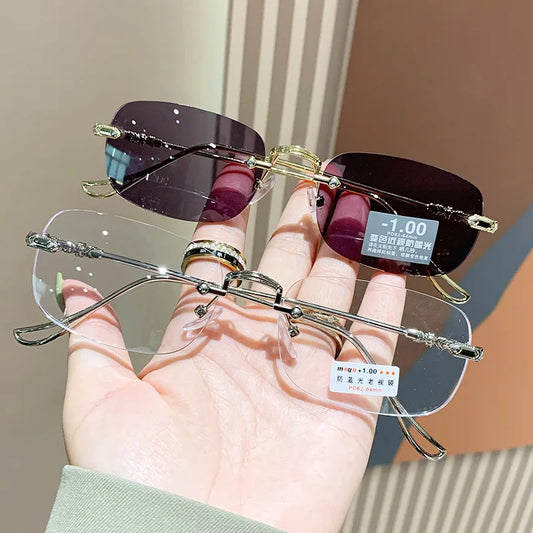 KLASSNUM Men Rimless Anti-Blue Light Glasses Photochromic Glasses Women Alloy Frame Ultra Light Computer Goggles Sunglasses 2025