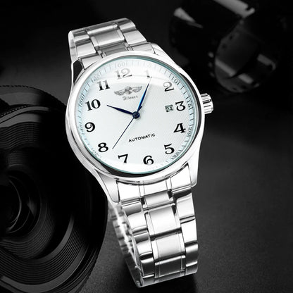Relógio clássico para homem – Estilo retro com calendário e ponteiros azuis, movimento mecânico automático, marca de prestígio, caixa em aço e bracelete em pele